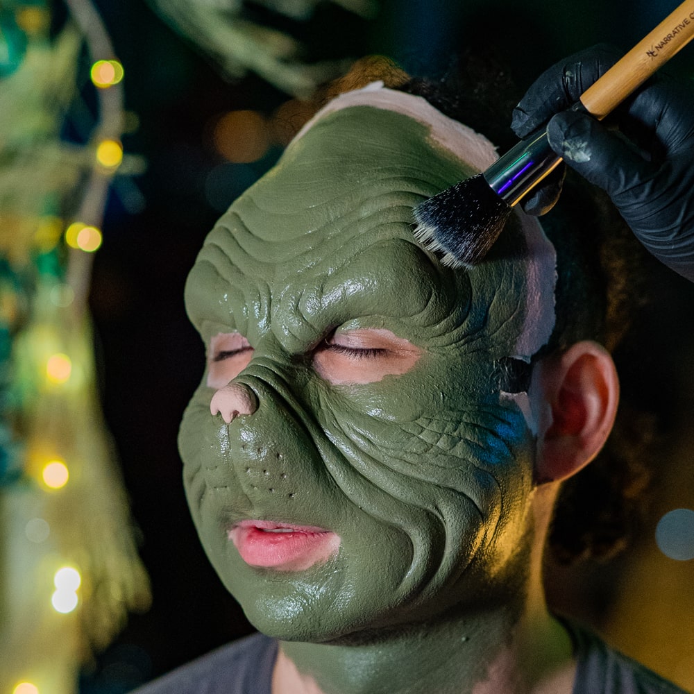 Makeup artist applying Collection