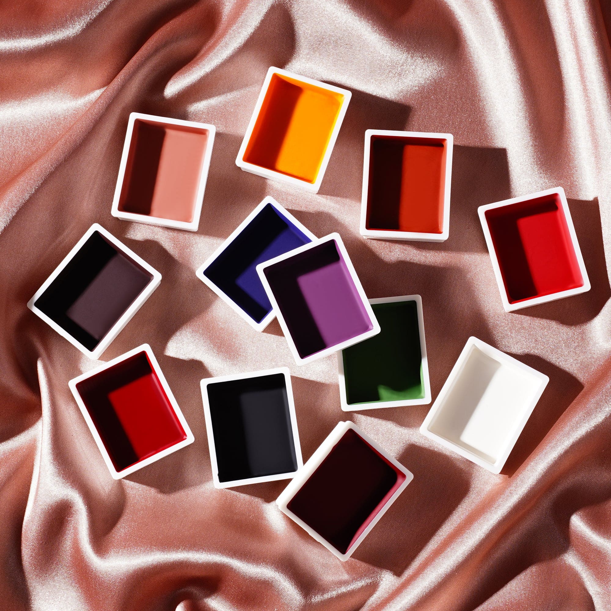 FX refill pan shade assortment on satin background